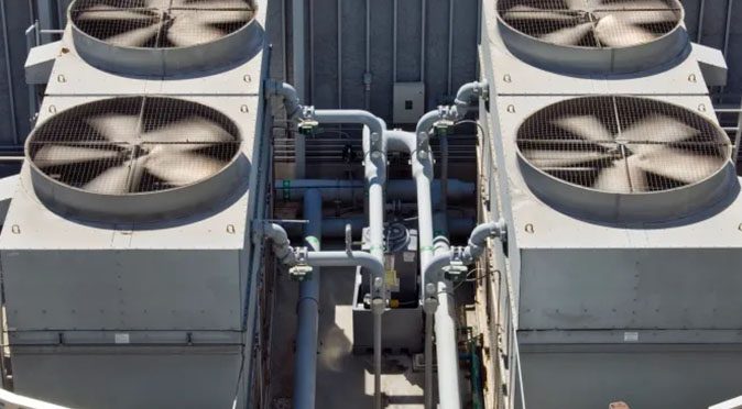 Air Conditioning Units Mounted On The Exterior Of A Building